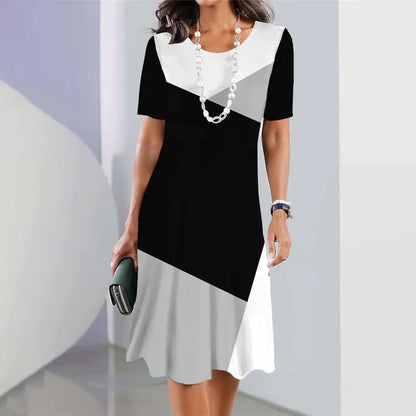 Damen Kleid – Leicht & Knielang – A-Linien-Schnitt mit Rundhals & Kurzarm